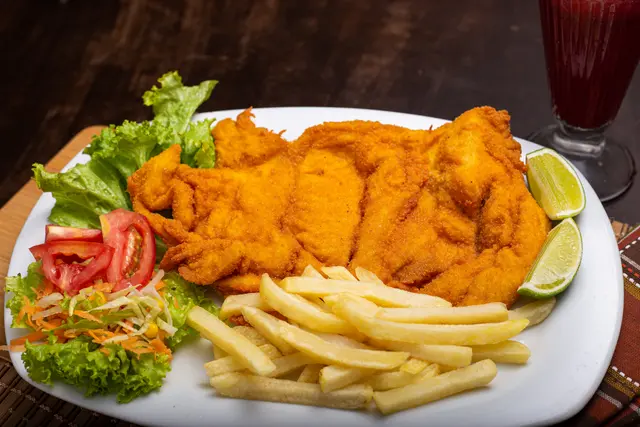 Chuleta de pollo con acompañamientos